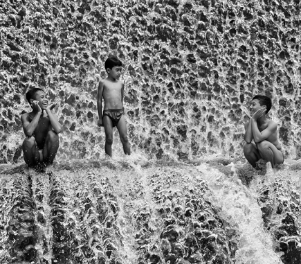 Boys playing on Unda River, Bali - B&W People Fine Art Series